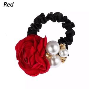 Elegant hair tie with flower and faux Pearls.NWT